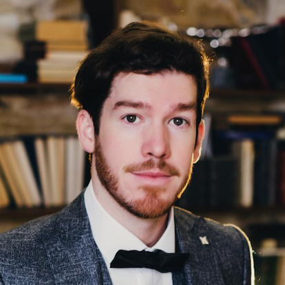 Jeston Cole Lewis in a suit with a bowtie